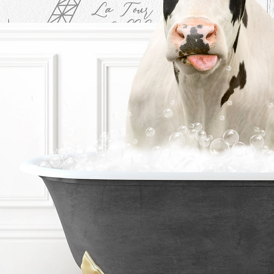 a cow sticking its tongue out in a bathtub filled with bubbles