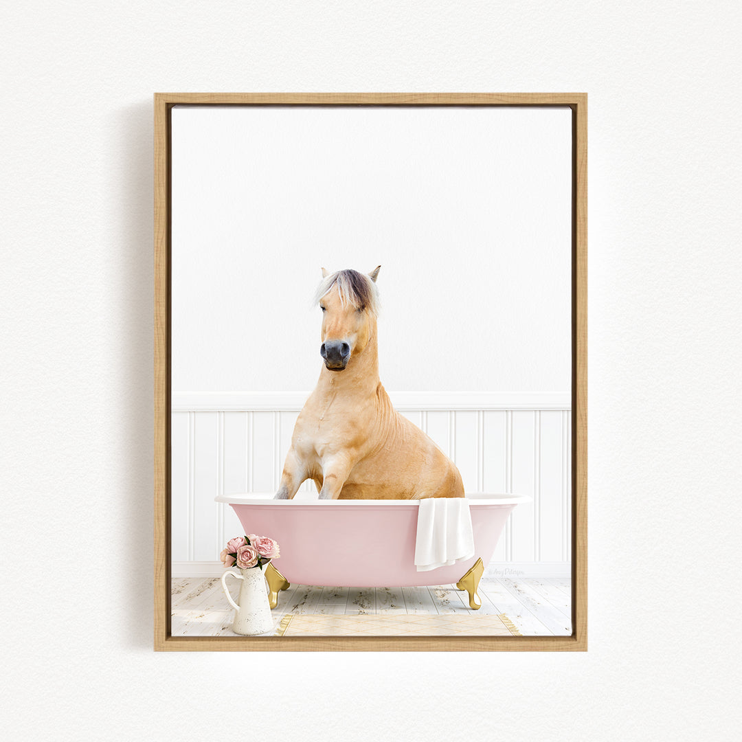 A brown horse sitting in a pink bathtub, surrounded by a white towel and pink flowers, creating a whimsical and charming scene.
