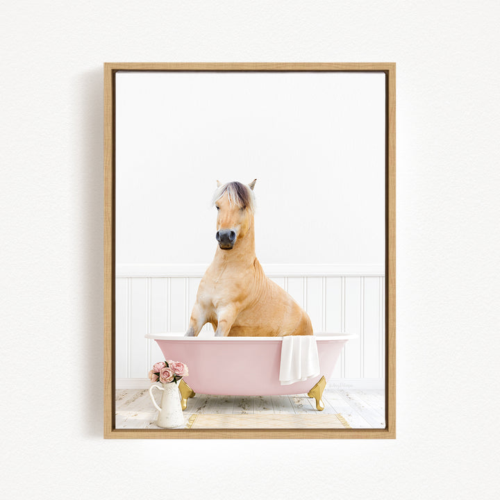 A brown horse sitting in a pink bathtub, surrounded by a white towel and pink flowers, creating a whimsical and charming scene.