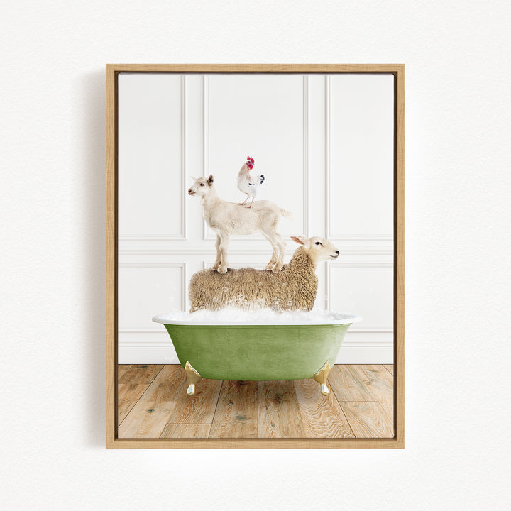 A framed image depicting a white goat standing on a brown sheep in a green bathtub, with a rooster perched on the sheep's back.