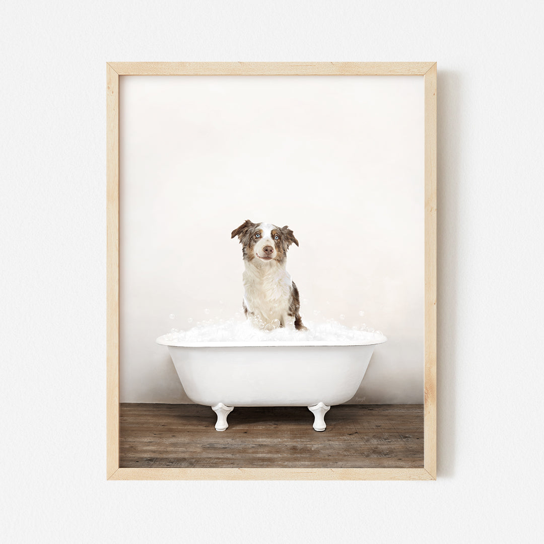 a dog sitting in a bathtub with foam on it