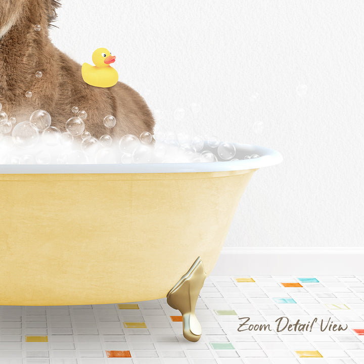A yellow bathtub filled with bubbles, with a rubber duck sitting inside.