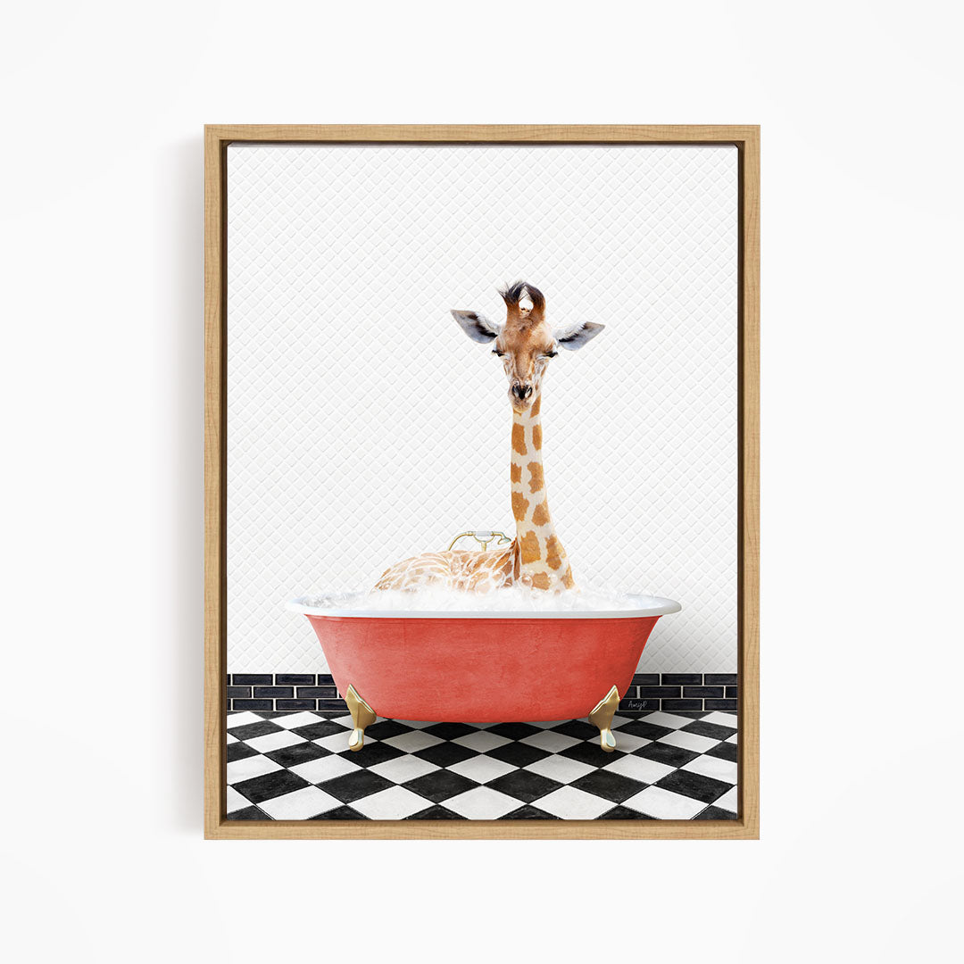 A giraffe is sitting in a red bathtub filled with bubbles, surrounded by a black and white checkered floor.
