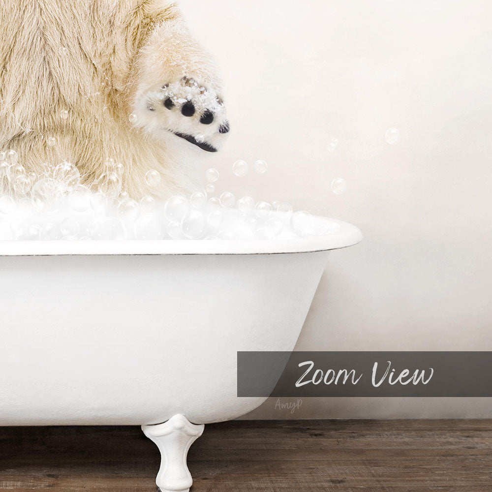 A polar bear's paw is submerged in a white bathtub filled with bubbles, creating a playful and whimsical scene.