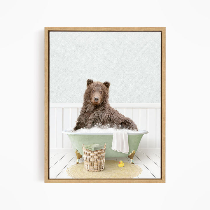 A brown bear sitting in a green bathtub filled with water, surrounded by rubber ducks and a basket.