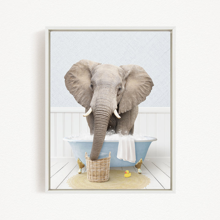 A gray elephant is standing in a blue bathtub filled with water, surrounded by rubber ducks.