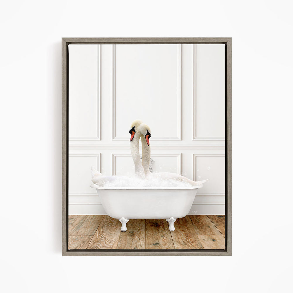 A pair of swans sitting in a white bathtub, with one of the swans appearing to be splashing water.