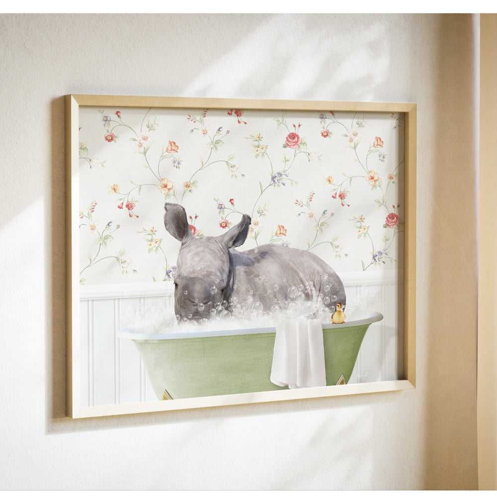 A rhinoceros is sitting in a green bathtub filled with bubbles, surrounded by a floral wallpaper.