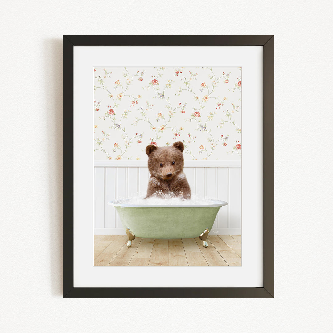 A brown bear sitting in a green bathtub, surrounded by a floral wallpaper.