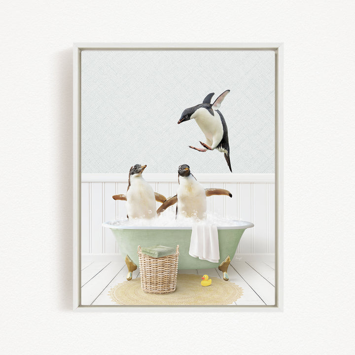 A framed image depicting two penguins sitting in a bathtub, with one penguin flying towards the other penguin.