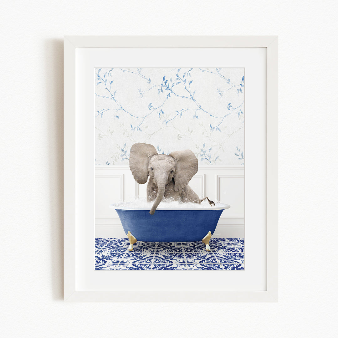 A baby elephant sitting in a blue bathtub filled with water, surrounded by a blue and white patterned wall.