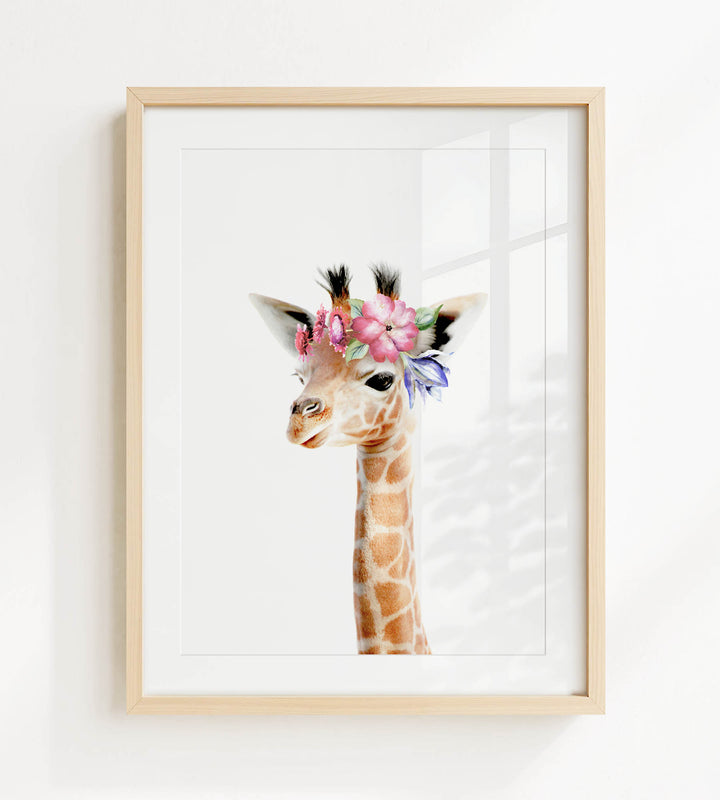 A giraffe wearing a flower crown is the central focus of the framed artwork.