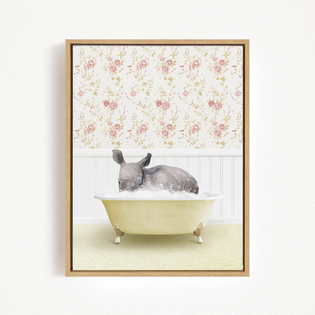 A gray rhinoceros is sitting in a yellow bathtub, surrounded by a floral wallpaper.
