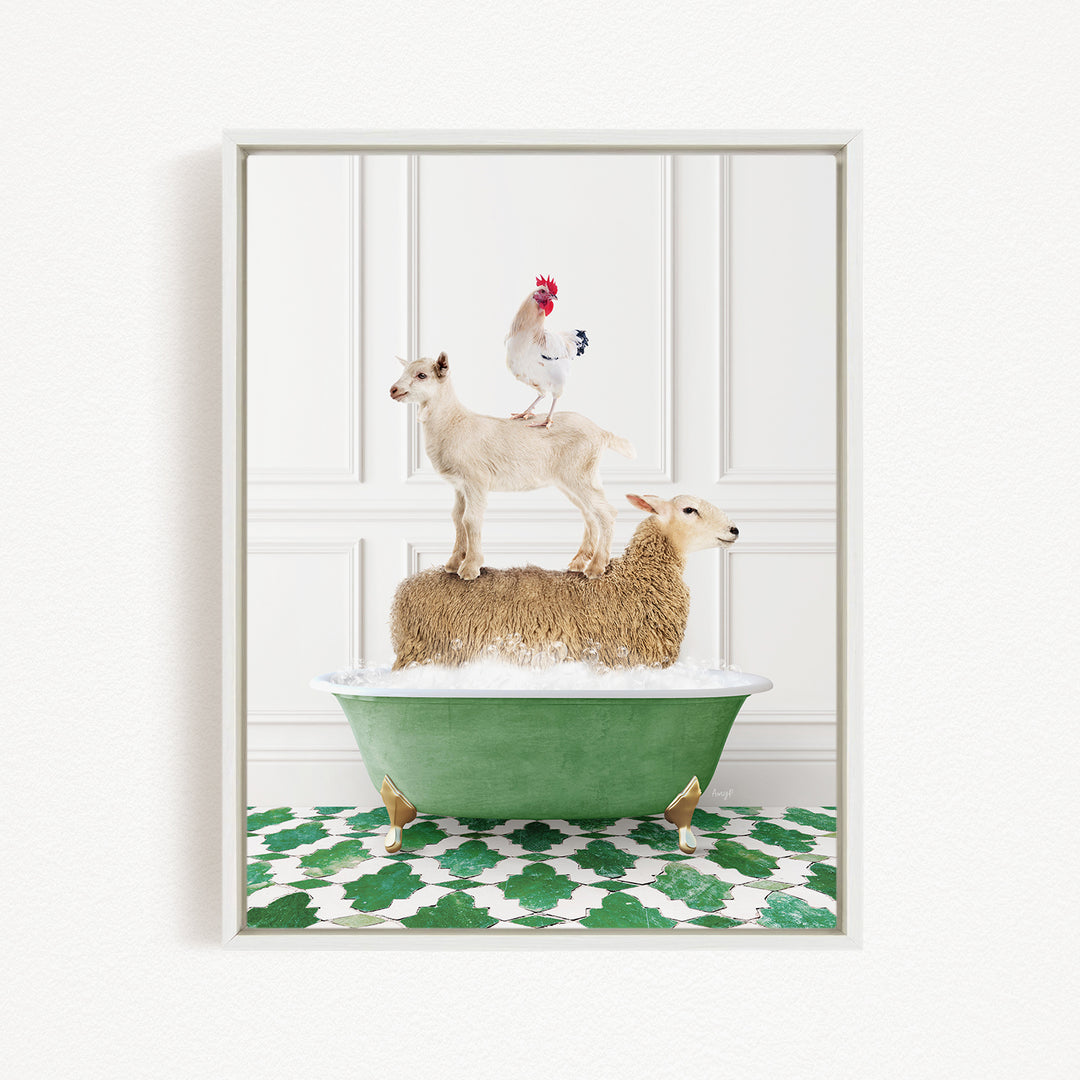 A framed image depicting a sheep standing on a goat's back, with a rooster perched on top of the goat, all atop a green bathtub.