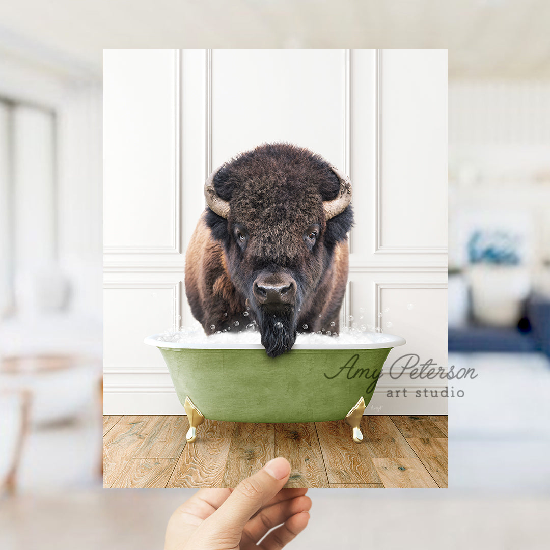 a bison is taking a bath in a green bathtub