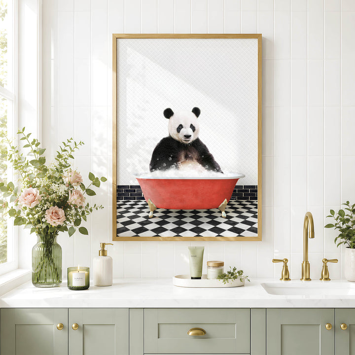 a bathroom with a framed picture of a panda sitting in a red bathtub, surrounded by flowers and a black and white checkered floor.