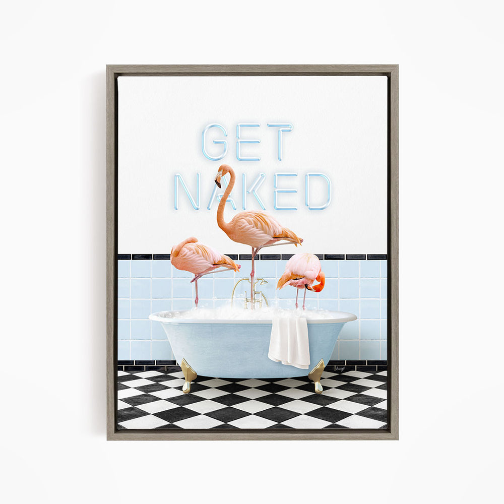 A framed image depicting three flamingos standing in a bathtub, with the text "GET NAKED" displayed above them.