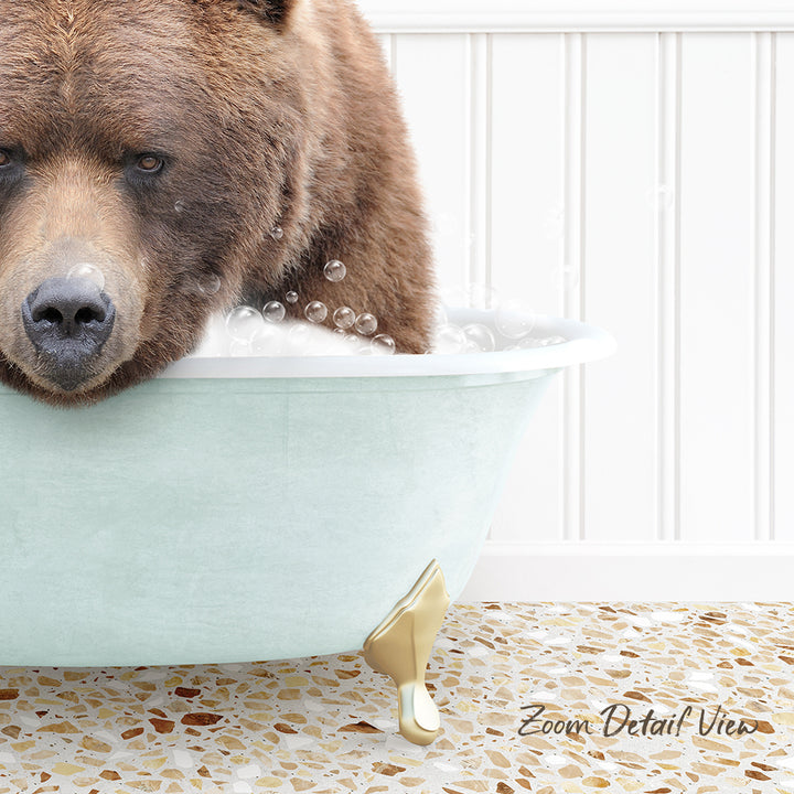 A large brown bear is sitting in a light blue bathtub filled with bubbles, appearing to enjoy a relaxing bath.