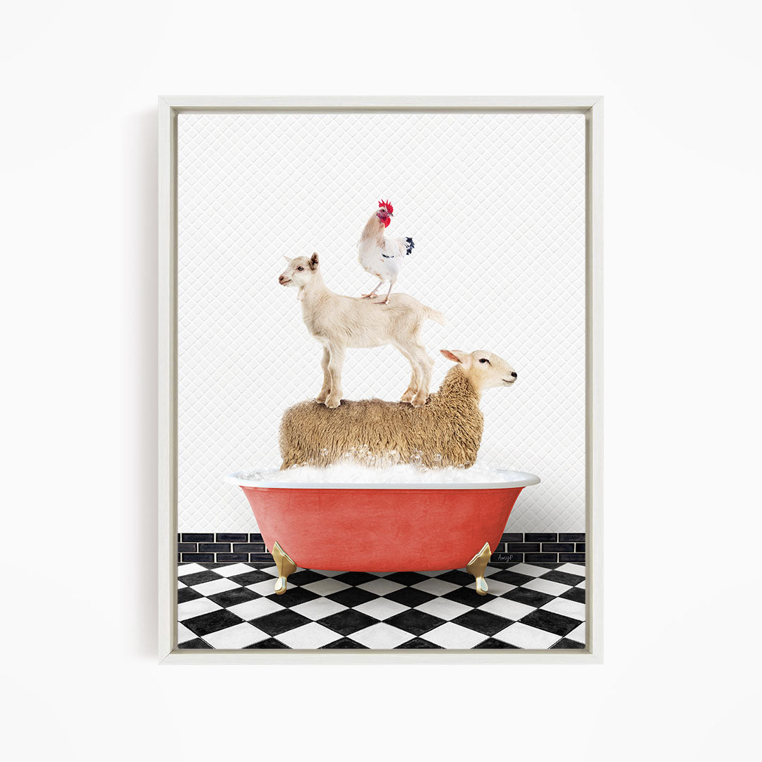 A framed image depicting a sheep standing on a goat's back, with a rooster perched on top of the goat, all in a red bathtub.