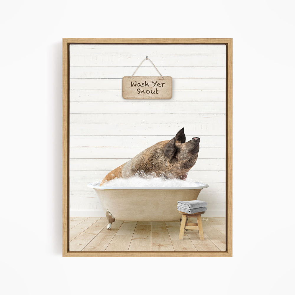 A brown dog is sitting in a bathtub filled with water, with a sign above it that says "Wash Yer Snout".