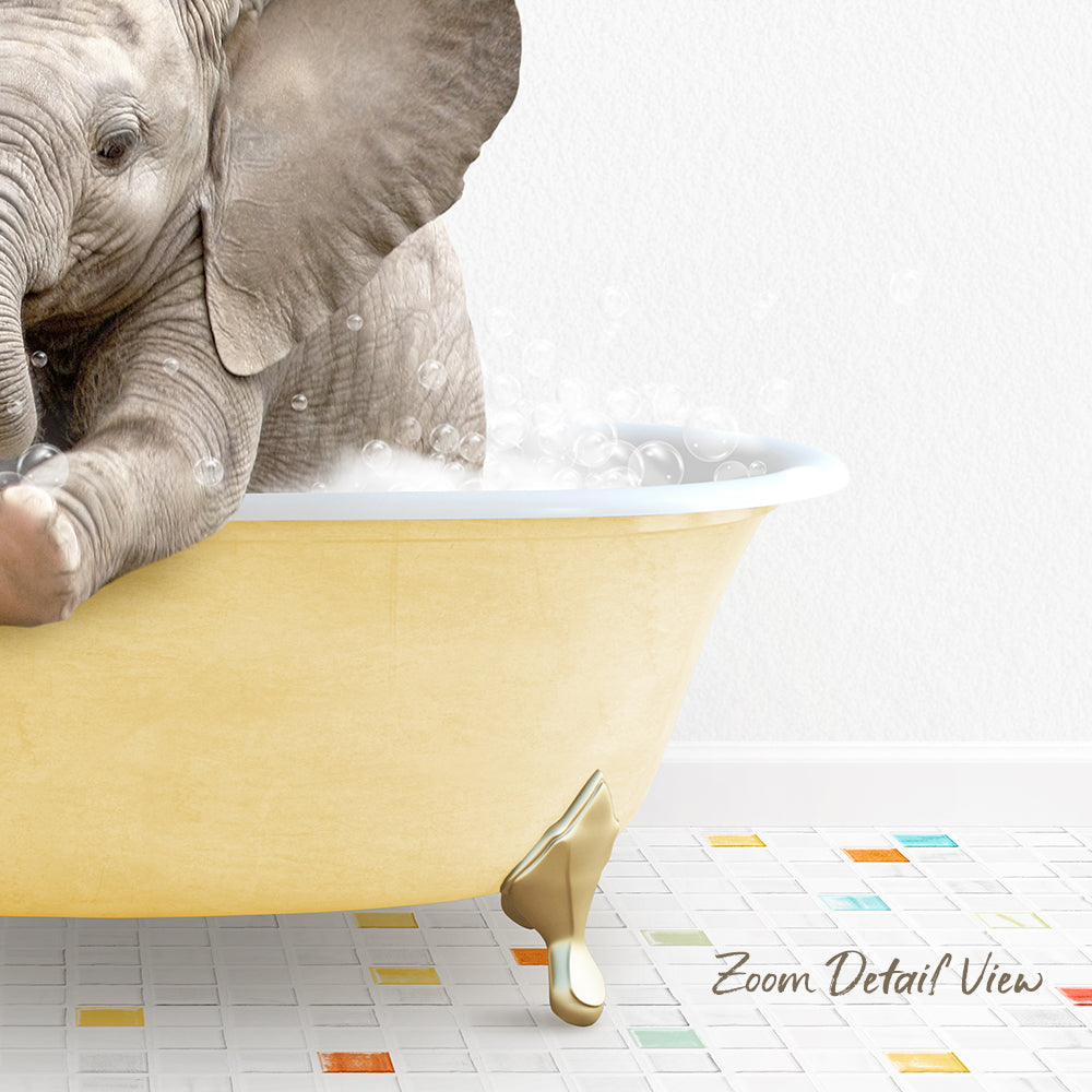 A baby elephant sitting in a yellow bathtub filled with bubbles, surrounded by colorful tiles on the floor.