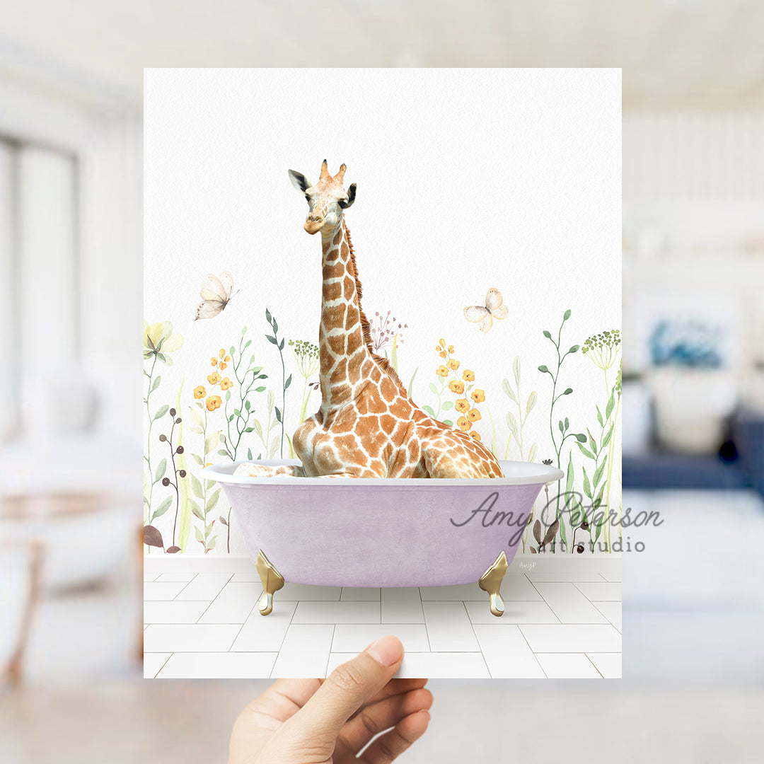 a giraffe sitting in a bathtub with flowers on the wall