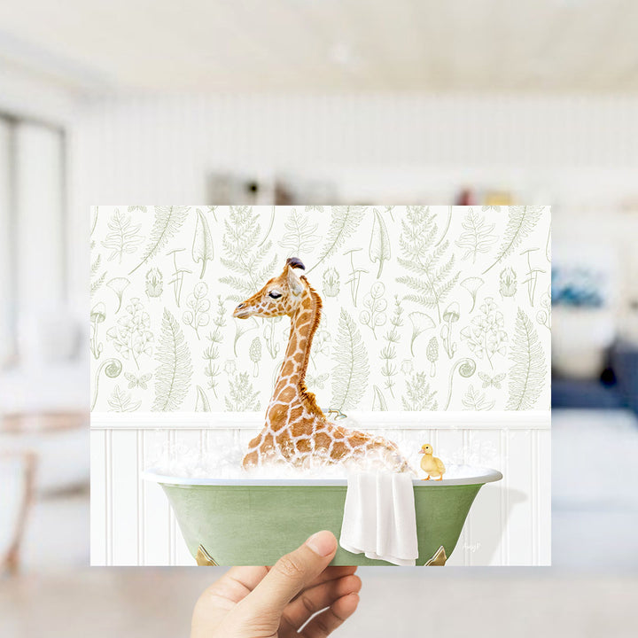 A giraffe sitting in a bathtub filled with water, surrounded by a towel and a small yellow duck.