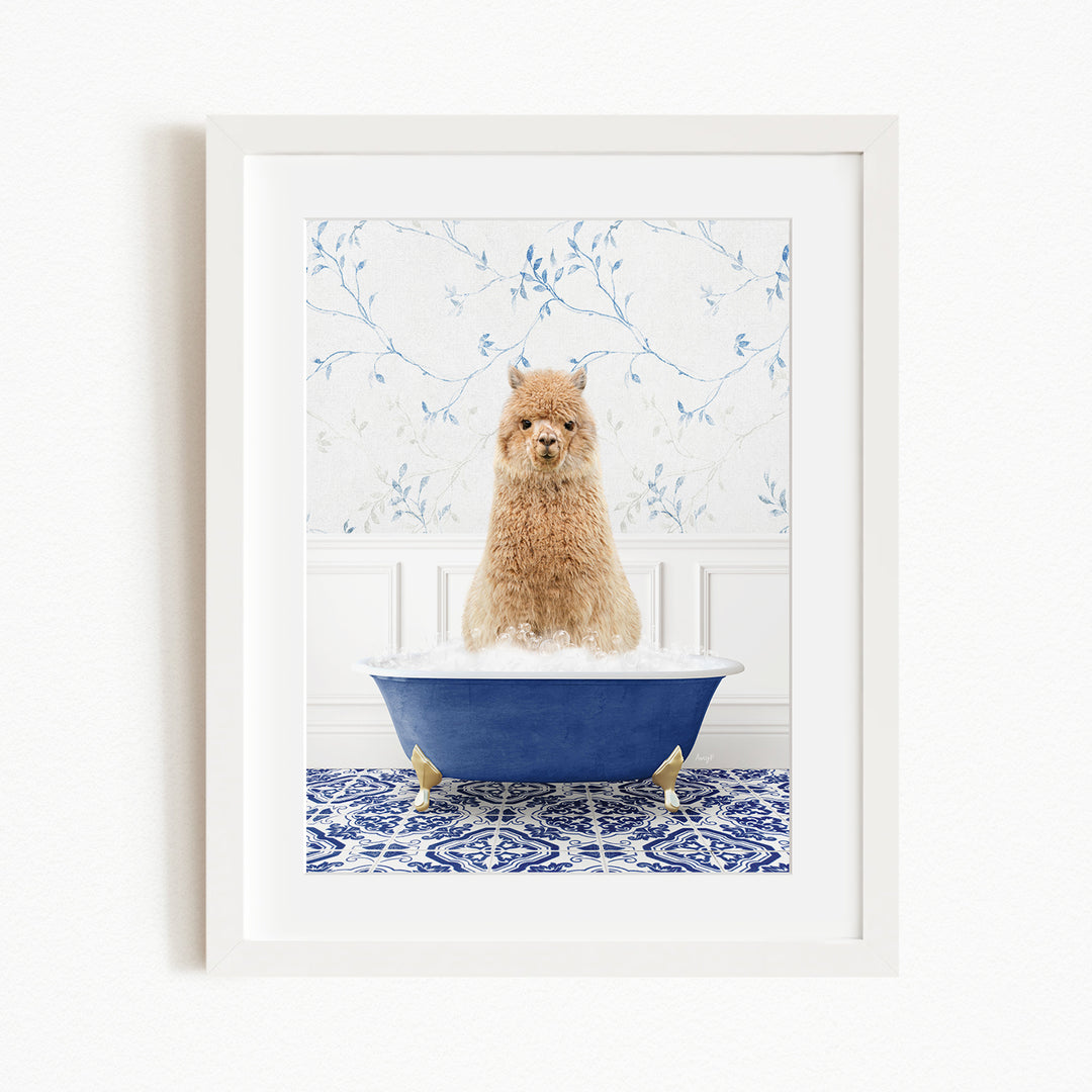 A fluffy brown dog sitting in a blue bathtub filled with bubbles, with a blue and white floral patterned wall behind it.