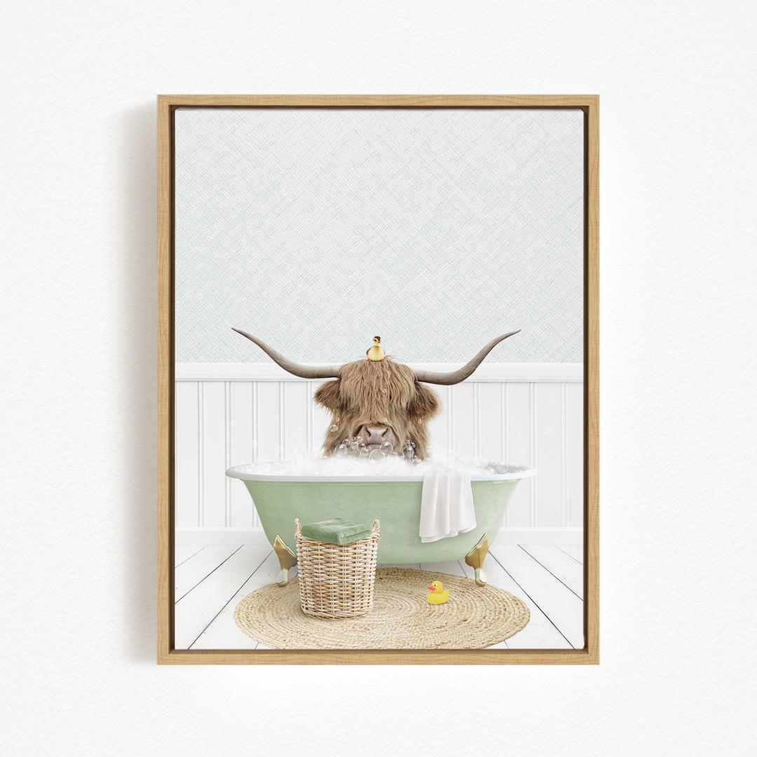 A horned animal, possibly a yak or a cow, is sitting in a green bathtub filled with water, surrounded by a basket and a yellow rubber duck.