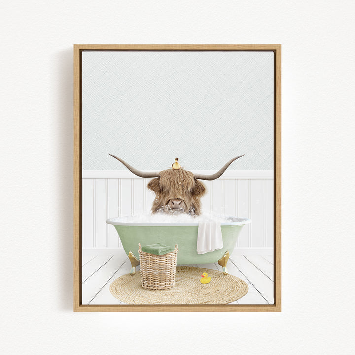 A horned animal, possibly a yak or a cow, is sitting in a green bathtub filled with water, surrounded by a basket and a yellow rubber duck.
