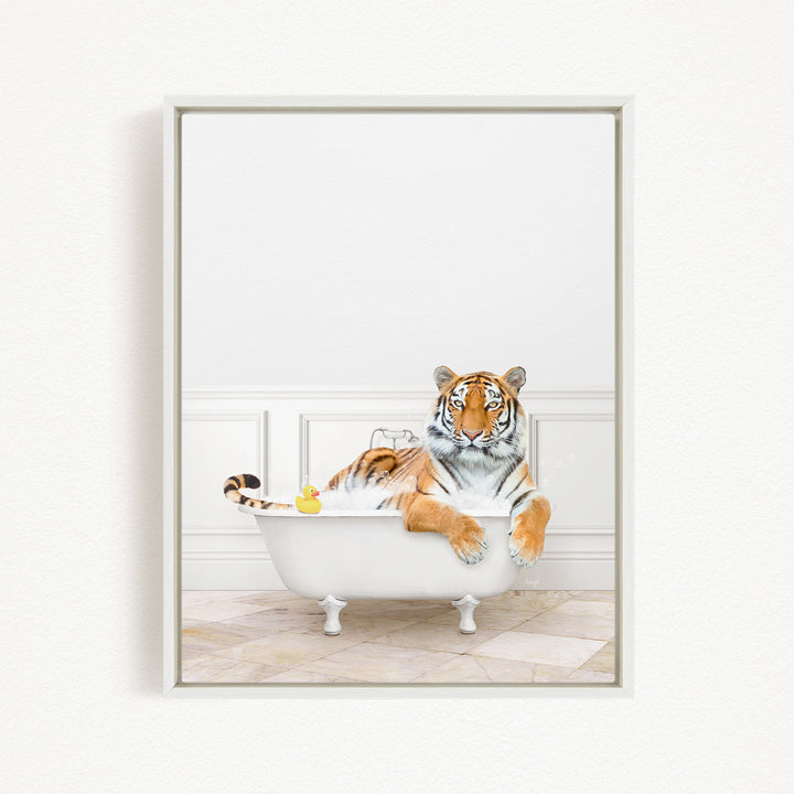 A tiger is sitting in a white bathtub, surrounded by rubber ducks.