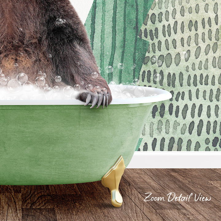 A close-up of a bear's paw resting on a green bathtub filled with bubbles, with a patterned wall in the background.