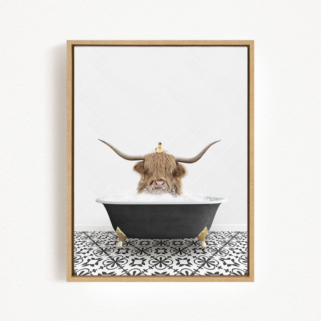 A Highland cow with large horns is sitting in a bathtub filled with bubbles, creating a whimsical and playful scene.