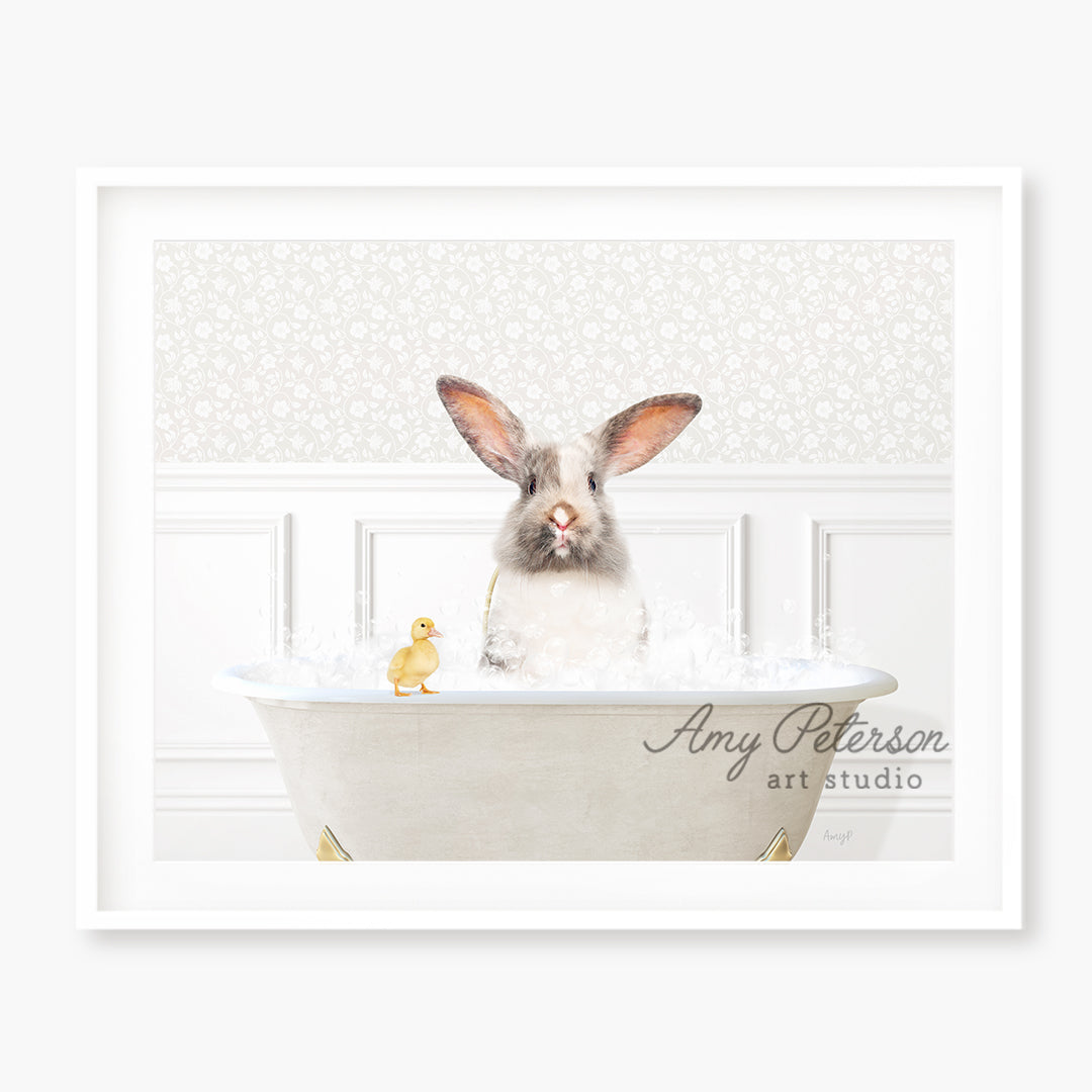 a picture of a bunny in a bathtub with a rubber duck