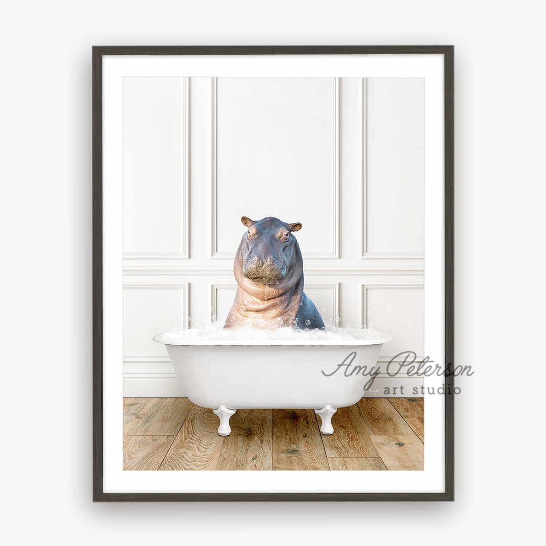 a hippopotamus sitting in a bathtub in a white room