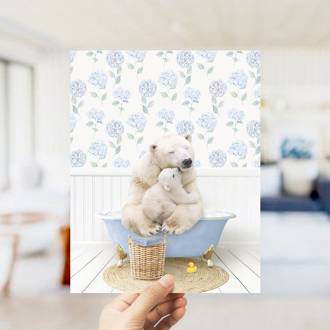 A polar bear is sitting in a bathtub, holding a baby bear, with a blue floral patterned wall behind them.