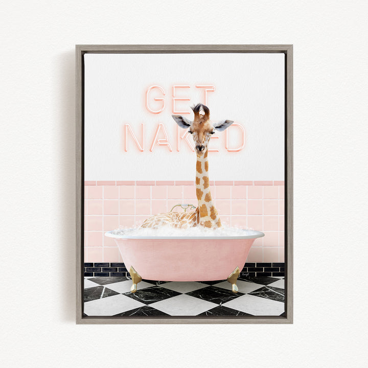 A giraffe sitting in a pink bathtub with the words "GET NAKED" written on the wall behind it.
