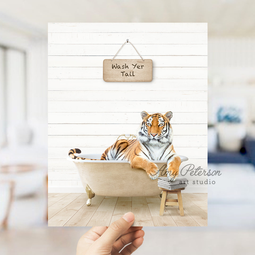 a hand holding up a card with a picture of a tiger in a bathtub