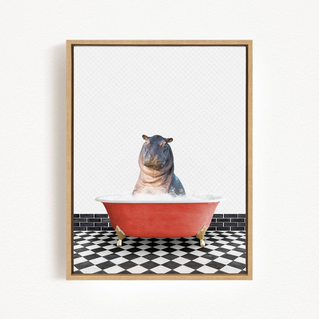 A framed image depicting a hippopotamus sitting in a red bathtub filled with water, surrounded by a black and white checkered floor.