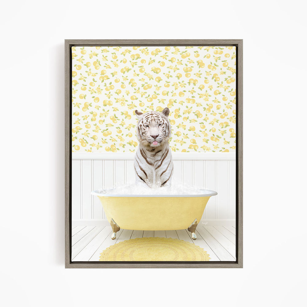 A white tiger is sitting in a yellow bathtub filled with water, surrounded by a yellow and white floral patterned wall.