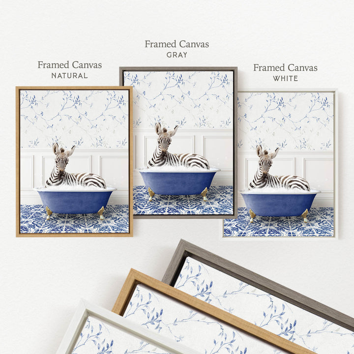 three framed prints of a zebra sitting in a blue bathtub, each with a different frame color: natural, gray, and white.