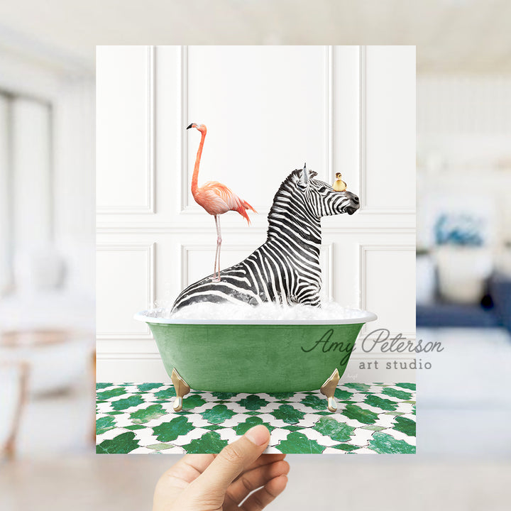 a hand holding a card with a zebra and a flamingo in a bathtub