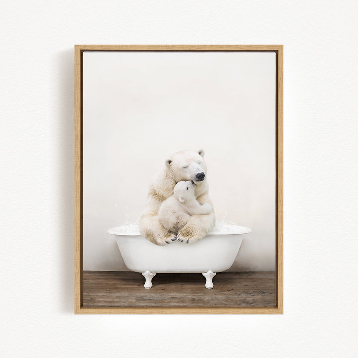 A mother polar bear and her cub sitting together in a white bathtub, with the mother appearing to be comforting her cub.