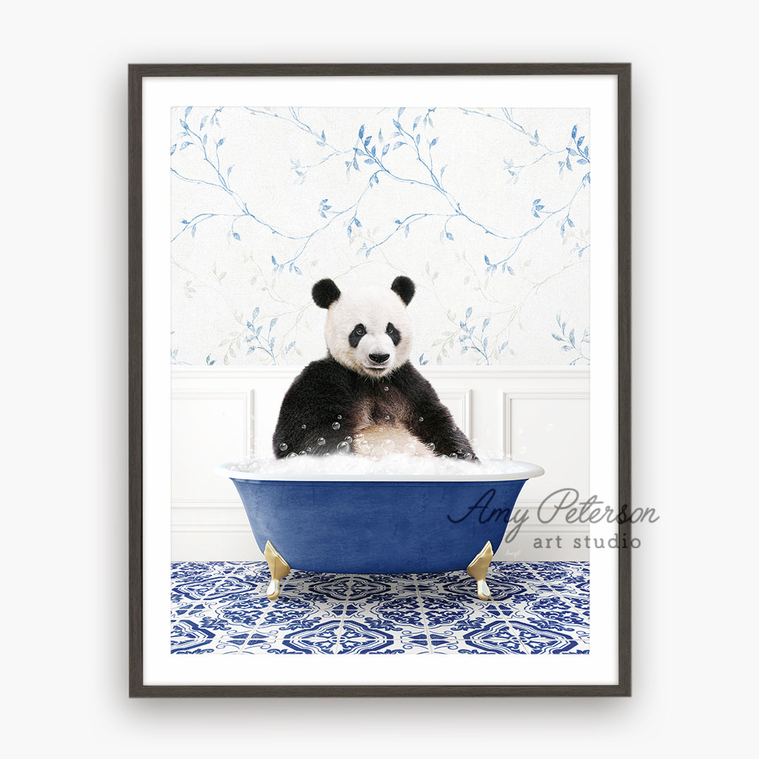 a panda bear sitting in a blue bath tub