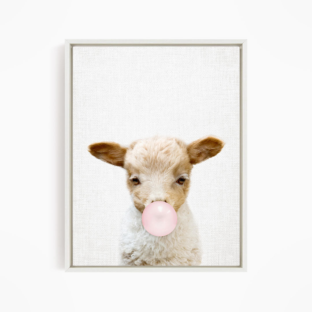 A cute lamb blowing a bubble with a pink bubble gum bubble.