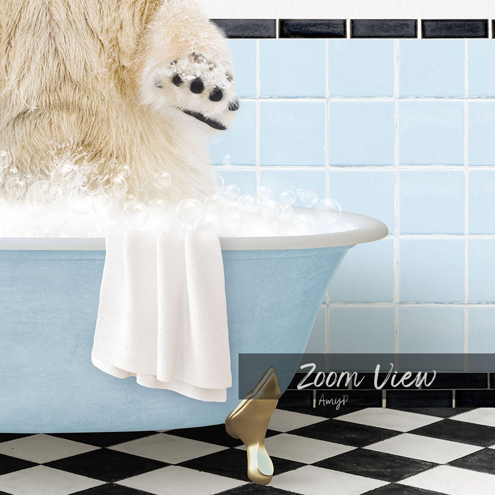 A fluffy white dog is sitting in a blue bathtub filled with bubbles, with a towel draped over the side and a gold bathtub faucet visible.