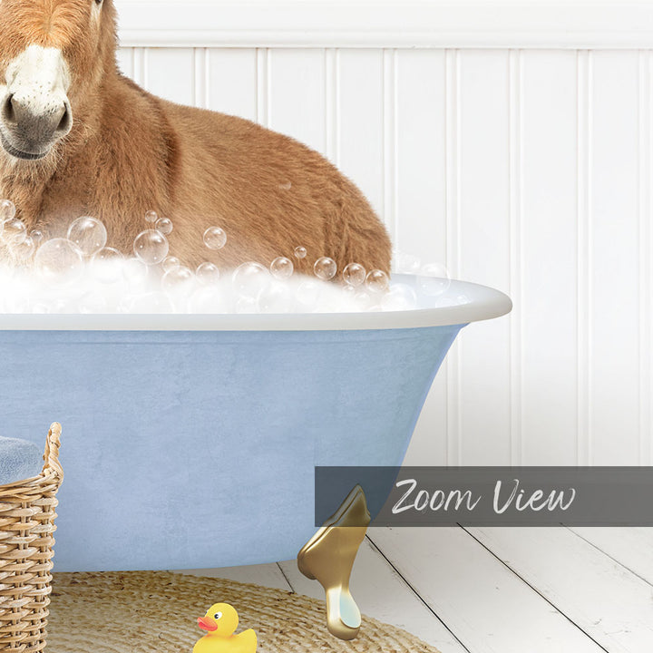 A brown horse is sitting in a blue bathtub filled with bubbles, surrounded by rubber ducks and a basket.
