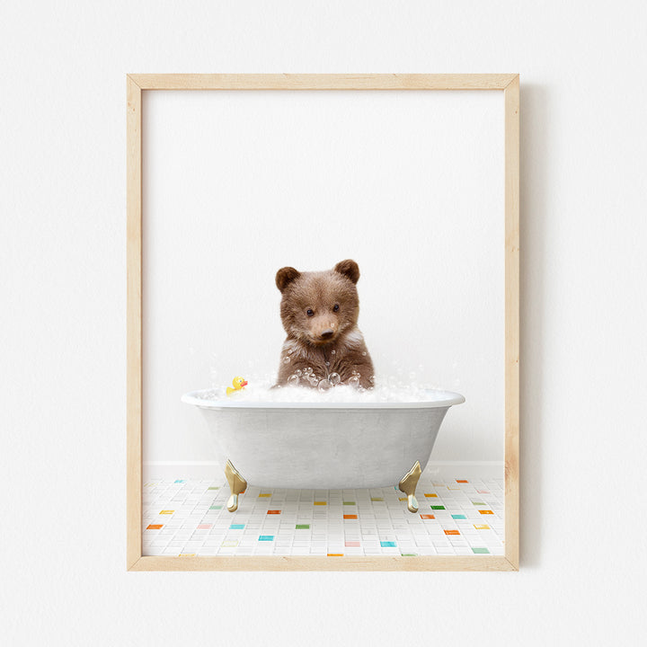 a teddy bear sitting in a bathtub with bubbles