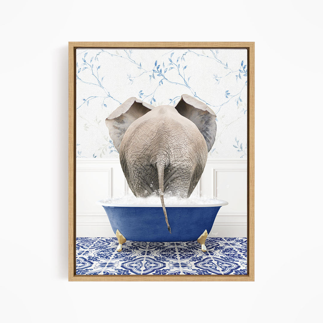 An elephant is sitting in a blue bathtub filled with water, surrounded by a blue and white patterned floor.