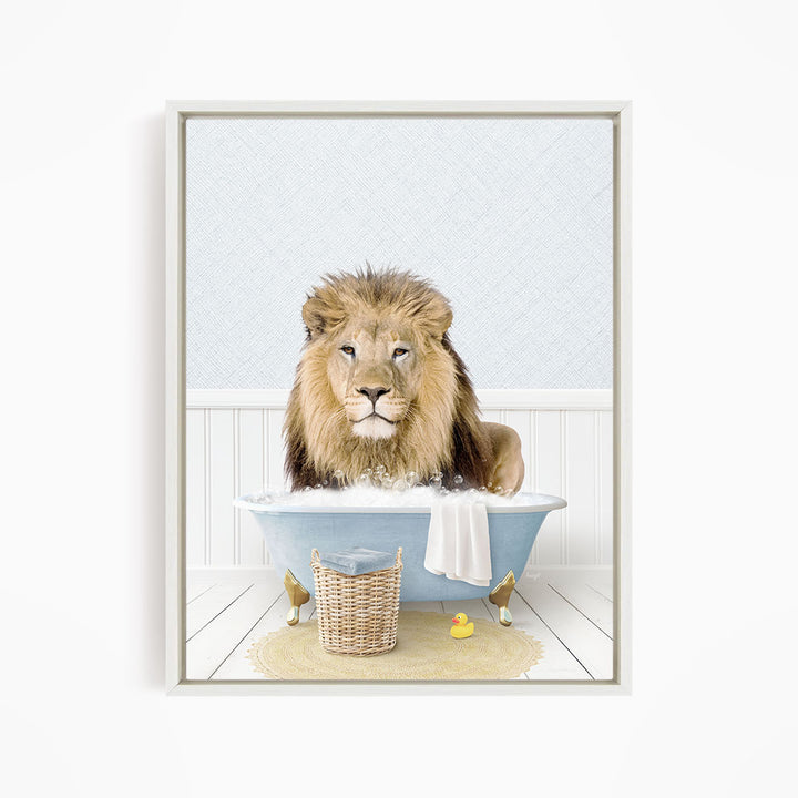 A lion sitting in a blue bathtub filled with water, surrounded by a yellow rubber duck and a basket.